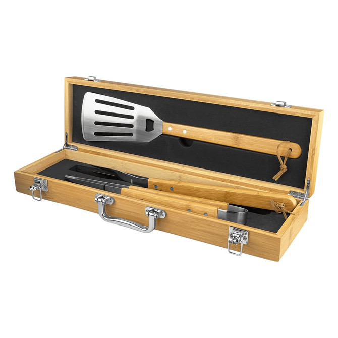 A BBQ set featuring a stainless steel spatula and tongs, housed in a wooden case with a sleek finish.