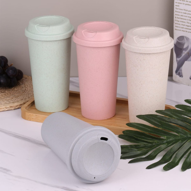 A collection of reusable coffee cups in mint green, blush pink, cream, and light blue, featuring matching lids and a logo.