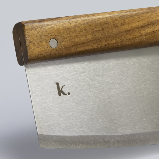 A wooden-handled cheese knife with a stainless steel blade, featuring a simple logo.