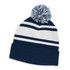 A navy and white striped beanie with a large pom pom on top and a folded cuff. Features a branding logo.