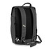 A grey flap backpack with padded straps and a top handle, featuring a minimalist design and a logo.