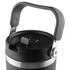 A travel mug with a black body, silver band, and a sturdy handle. It features a secure lid and a branding logo.