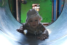 New Hampshire_child_playing_happy_crawling