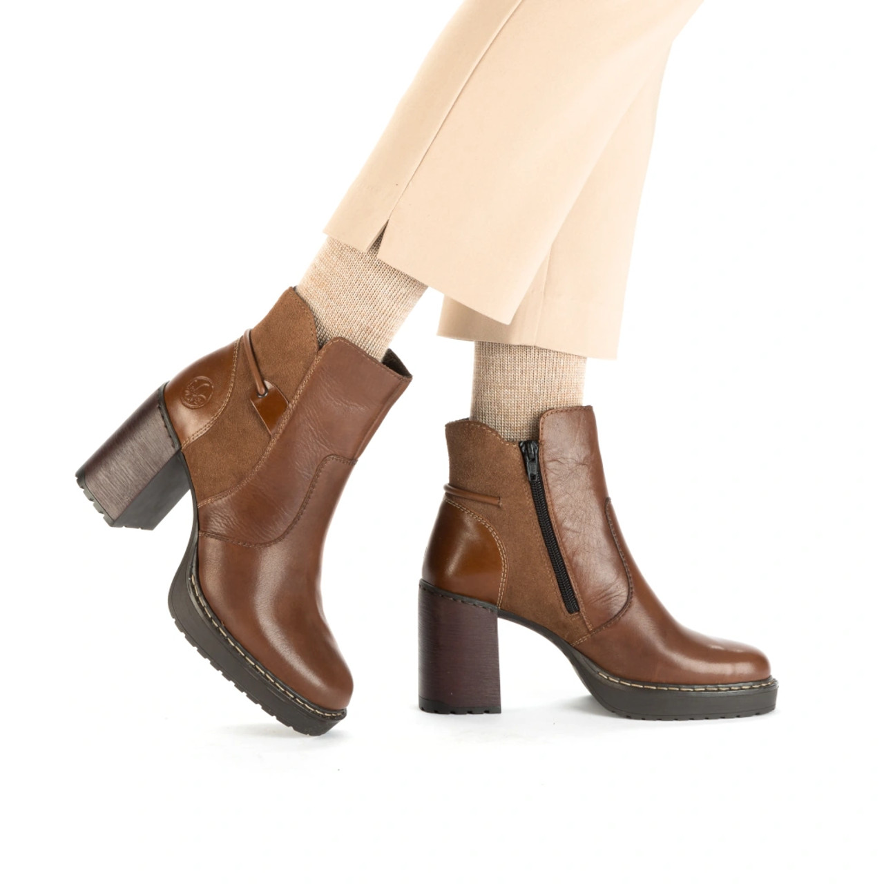 Tan high clearance ankle boots