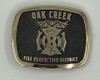 Oak Creek Fire Protection District (structure) Buckle (RESTRICTED)