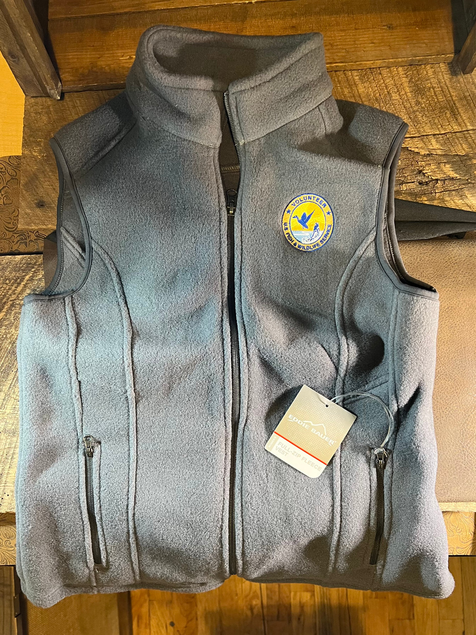 Fish & Wildlife Service Volunteer Eddie Bauer® - Women's Fleece Vest (gray  steel) Medium 35% off - Western Heritage Company, Inc