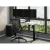 Shop Serene 2.0 Flip Arm Mesh Back Task Chair with Black Frame shown with sit stand desk