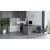 OfficeSource | Merak | Sled Base Guest Chair in Black Faux Leather with Chrome Base shown in office setting