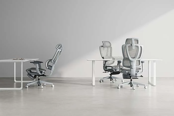 Grey frame and mesh Seating Star Mesh Chairs in office setting