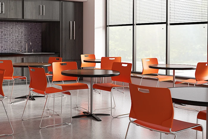 Kelley Stack Chairs in Tangerine Orange sown in breakroom