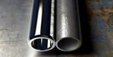 Stainless vs Carbon Steel Hose Fittings: Material Choice and Service Life