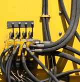 Construction Equipment Hydraulics: Hose Protection and Fitting Checks in Harsh Jobsites