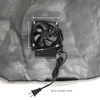 Faux rock with vent and fan