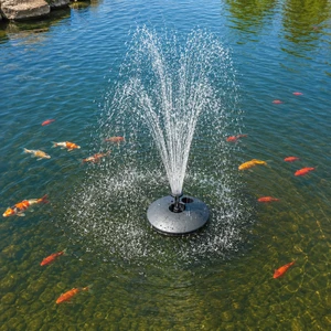 Floating pond fountain aerator spraying multiple streams of water in a clear pond, surrounded by colorful koi fish swimming near the surface.