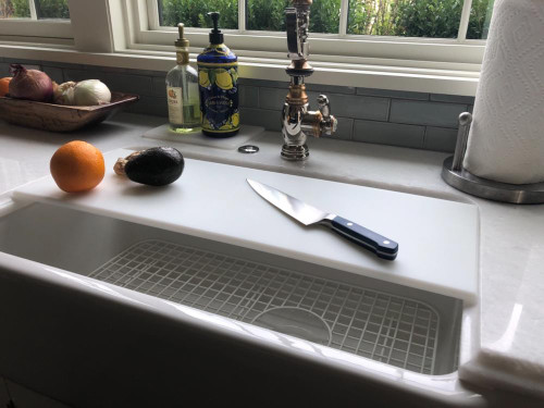 https://cdn11.bigcommerce.com/s-ym66unw/images/stencil/500x659/products/801/5540/Custom-Platic-cutting-board-sink-cover__97670.1639408090.jpg?c=2