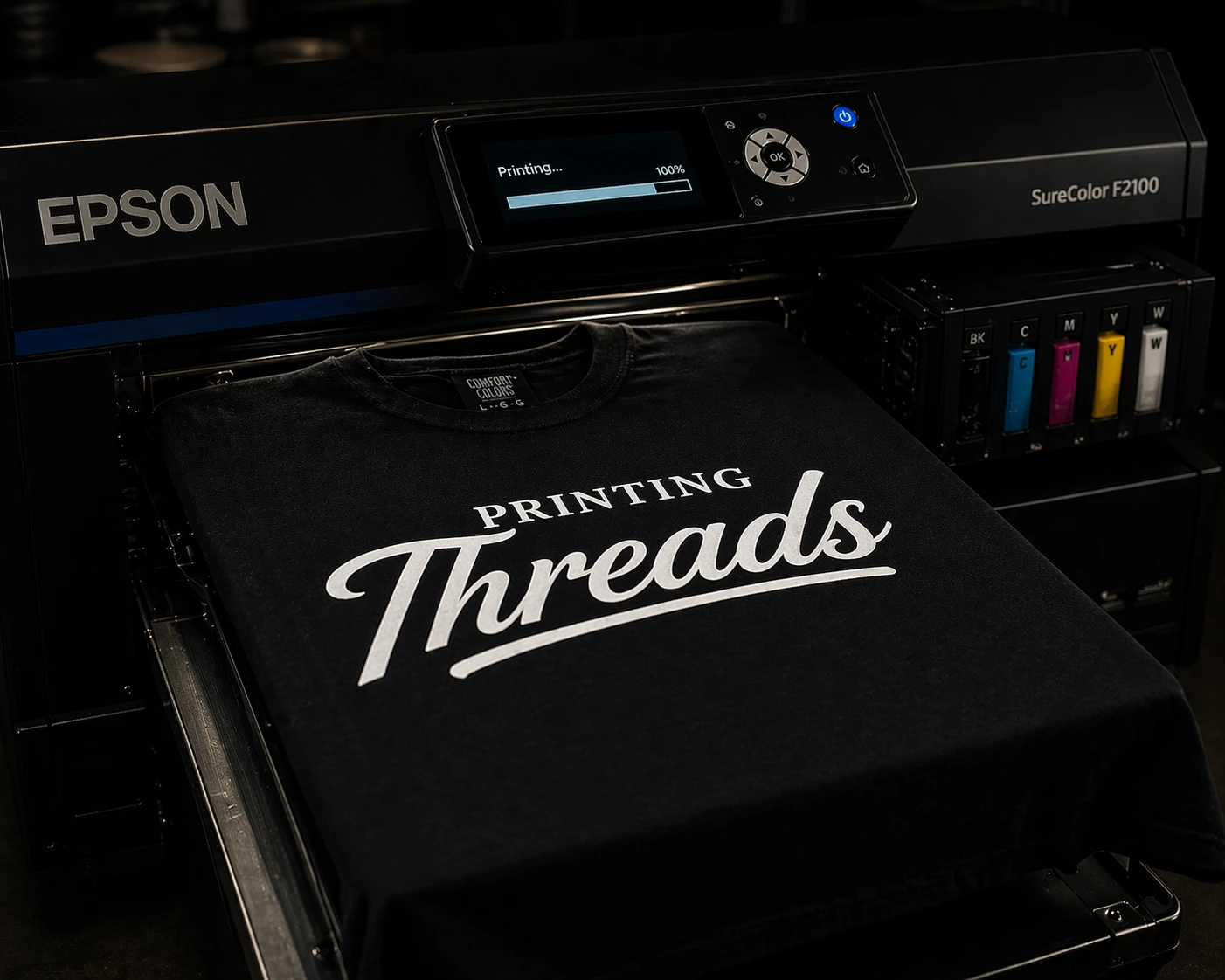 DTG printer applying full-color design to a white t-shirt