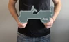 Jeep Cut-Out Emblem Metal Sign (holding in hand)