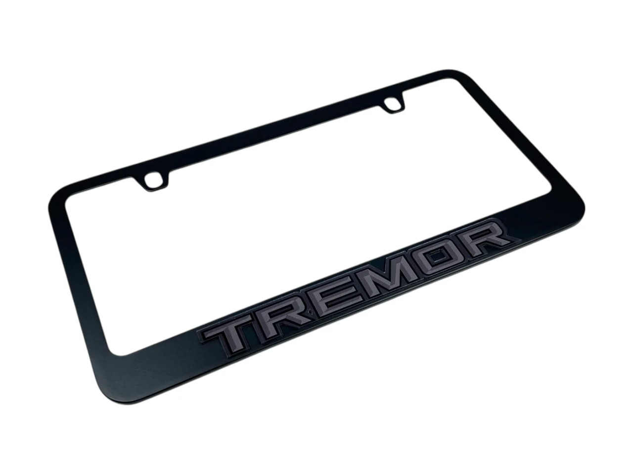 Ford Tremor Black License Plate Frame - Dark Lettering (angled)