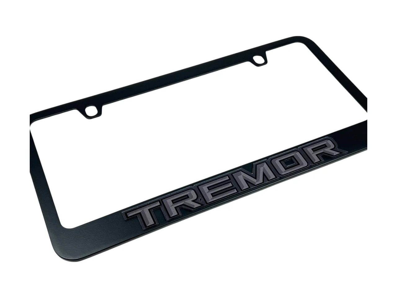 Ford Tremor Black License Plate Frame - Dark Lettering (angled zoom)