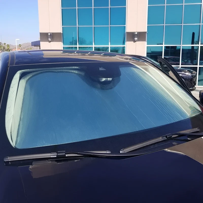 Custom Fit Roll Up Windshield Sun Shade - on dark car