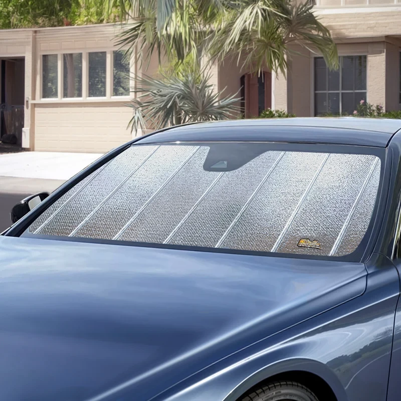 Custom Fit Ultimate Reflector Folding Windshield Sun Shade - on blue car