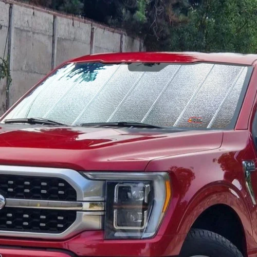 Custom Fit Premium Folding Windshield Sun Shade - on red truck