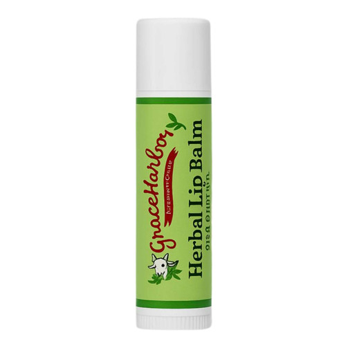 Grace Harbor Herbal Lip Balm standing upright on a transparent background with bright green label and white cap.
