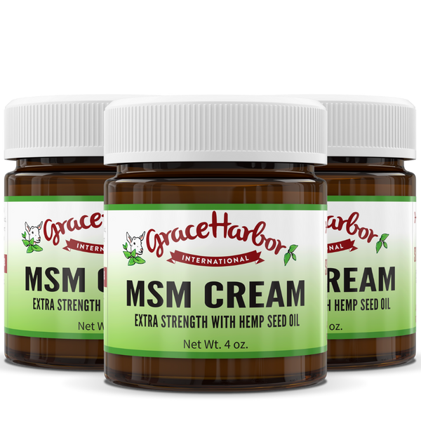 A 4 ounce jar of Grace Harbor Extra Strength MSM Cream, featuring a clean, minimalistic label. This handcrafted product is enriched with 50% more MSM and Vitamin E, perfect for skin, muscle, and joint therapy.