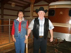 Tim and Grace Lukens with dairy goats at Grace Harbor Farms in Washington