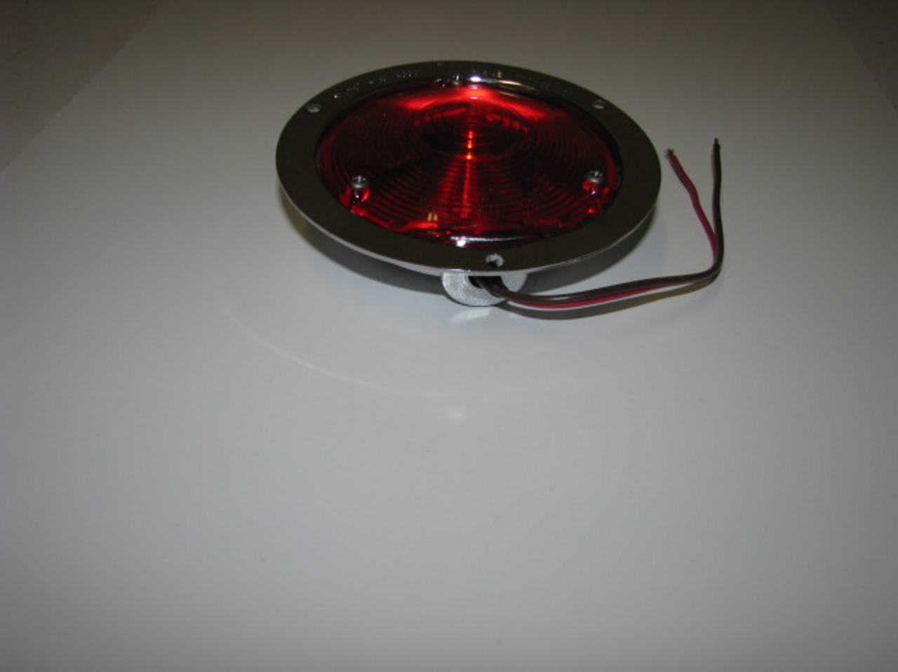 Die Cast Stop/Turn/Tail Light - Chrome (CLT041) ANGLED VIEW 