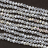 Crystal 3x4mm Clear Rondelle Beads with an AB finish - Approx. 15 inch strand