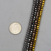 Cherry Tree Beads Synthetic Hematite 3x4mm Faceted Rondelle Beads in colors Natural (Matte),  Natural (Gloss), Bronze, and Gold with dime for size reference