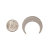 Cherry Tree Beads Silver 304 Stainless Steel 25x30mm Horizontal Crescent Moon Components with 2 Holes next to a coin