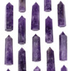 Natural gemstones featuring amethyst crystal towers measuring approximately 2-2.25 inches with a partial drilled hole, perfect for energy healing, décor, or jewelry making, sold as 1 piece.