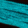 Glow-in-the-Dark Glass Round Beads - 4mm, Lavender #12, 15 inch strand, glowing brilliantly in a mesmerizing blue hue, perfect for jewelry making and craft projects featuring radiant beads that glow in the dark.