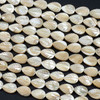 Mother of Pearl 8x12mm Tan Carved Leaf Beads - 16 inch strand