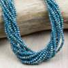 Crystal Beads - 2.5x3mm Faceted Rondelles, Opaque Peacock Blue with an AB finish, 15 inch strand
