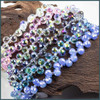 Cherry Tree Beads Crystal Beads - 8x10mm Faceted Top Drilled Rounded Teardrop with an AB finish, 8 inch strand 