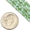 Cherry Tree Beads Crystal Beads - approx. 2x2.5mm Opaque Light Seafoam Green Faceted Rondelles with a Green Rainbow finish, 15 inch strand  Cherry Tree Beads Crystal Beads - approx. 2x2.5mm Opaque Light Seafoam Green Faceted Rondelles with a Green Rainbow finish, 15 inch strand