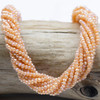Cherry Tree Beads Crystal Beads - approx. 2x2.5mm Opaque Peach Fuzz Faceted Rondelles with AB finish, 15 inch strand  Cherry Tree Beads Crystal Beads - approx. 2x2.5mm Opaque Peach Fuzz Faceted Rondelles with AB finish, 15 inch strand