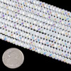 Cherry Tree Beads Crystal 2x4mm Faceted Heishi Beads - 8 inch strand, with a coin for size comparison.