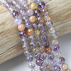 Super Seven 6mm Round Beads - 15 inch strand