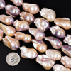 Cherry Tree Beads Freshwater Pearl approx. 13x23mm Peach, Pink, & Purple Baroque Beads - 8 inch strand 