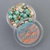 Sea & Sand Crystal Bead Designer Collection featuring sparkling crystal beads in shades of aqua, turquoise, cream, and beige.