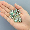 Cherry Tree Beads Ocean Haze Crystal Bead Designer Collection shown in hand to display the variety of crystal, pearl, and glass beads.