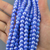 Cherry Tree Beads Mystic Glass 8mm Rounds Beads - 8 inch strand 