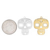 Stainless steel sugar skull charms for DIY projects.