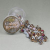 Vintage bronze-toned bead kit.