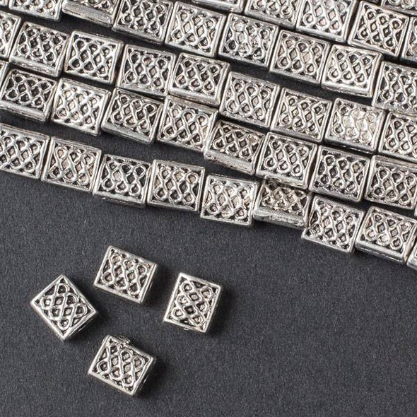 Silver Pewter 6x12mm Rectangle Beads with Circle Pattern - approx. 8 inch strand - basea5039s