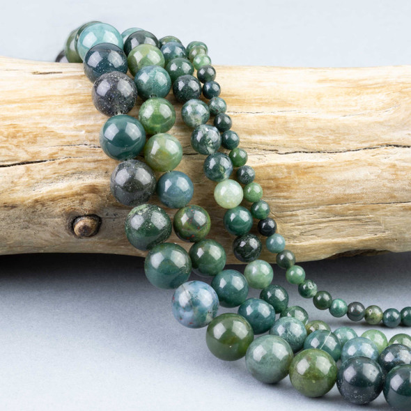 mossy greens, browns, and blue tones in round beads